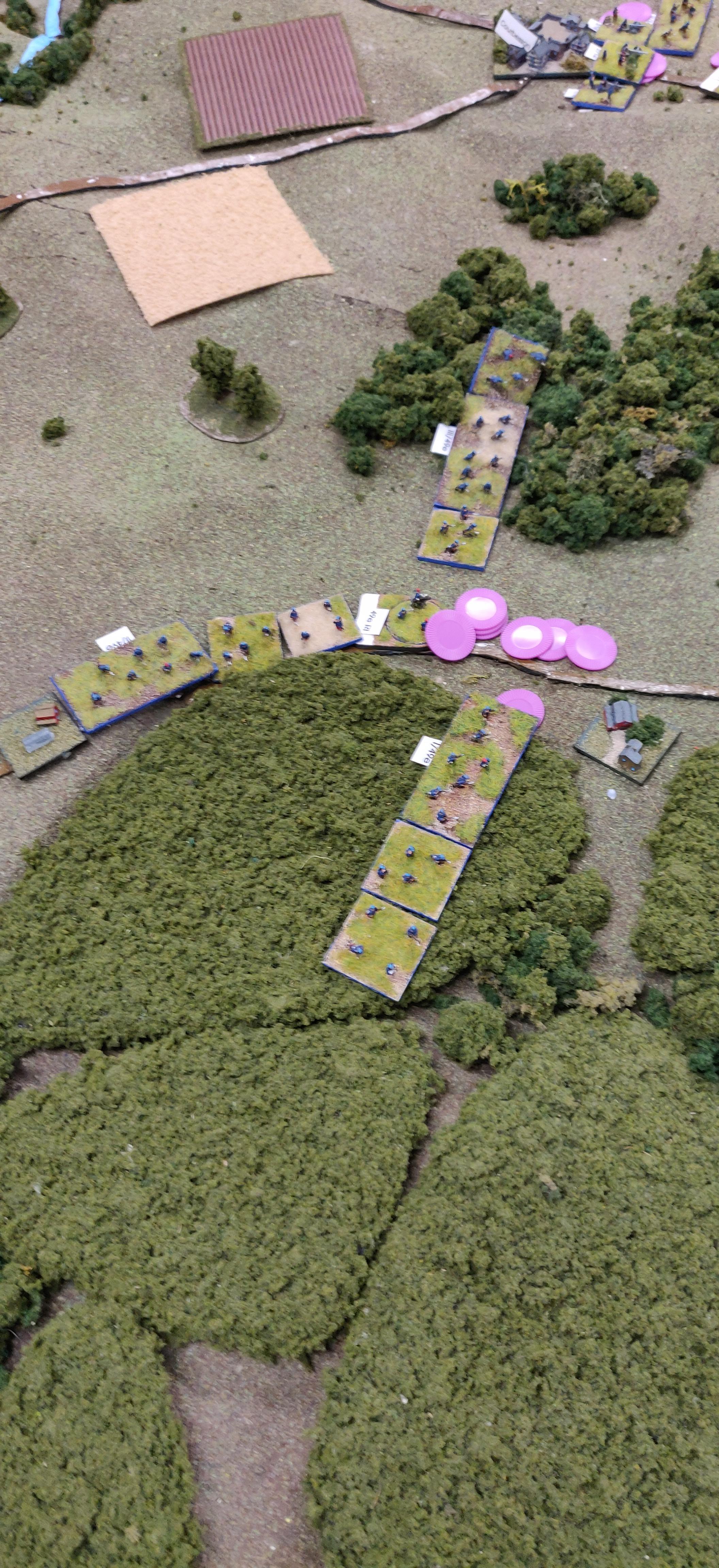 The 49e Regiment deploys along the Marchais road. The purple tokens represent orders, both to the regiment and the Battalion. Here, the large number represents a few bad dice rolls causing a breakdown in command and control.