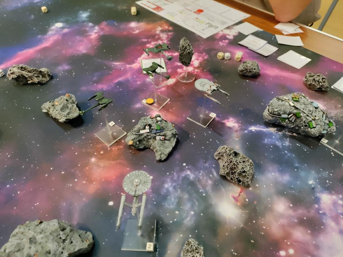 USS Long Beach and Agincourt face off a Klingon raiding party in an asteroid field!