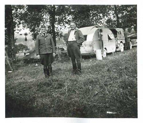 Germans with a captured camping trailer towed by a captured British CS8